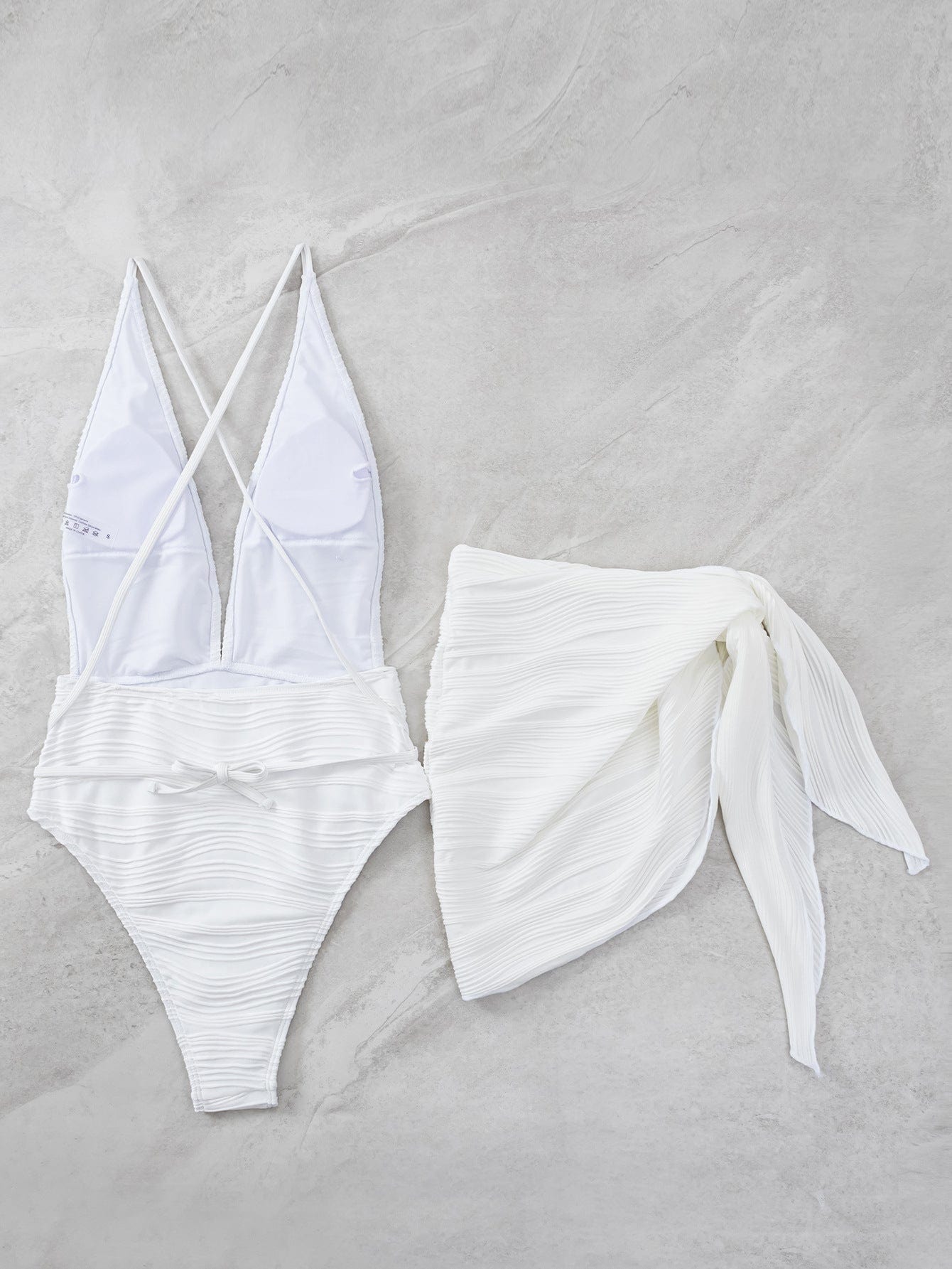 Glowwom White textured deep V one-piece swimsuit