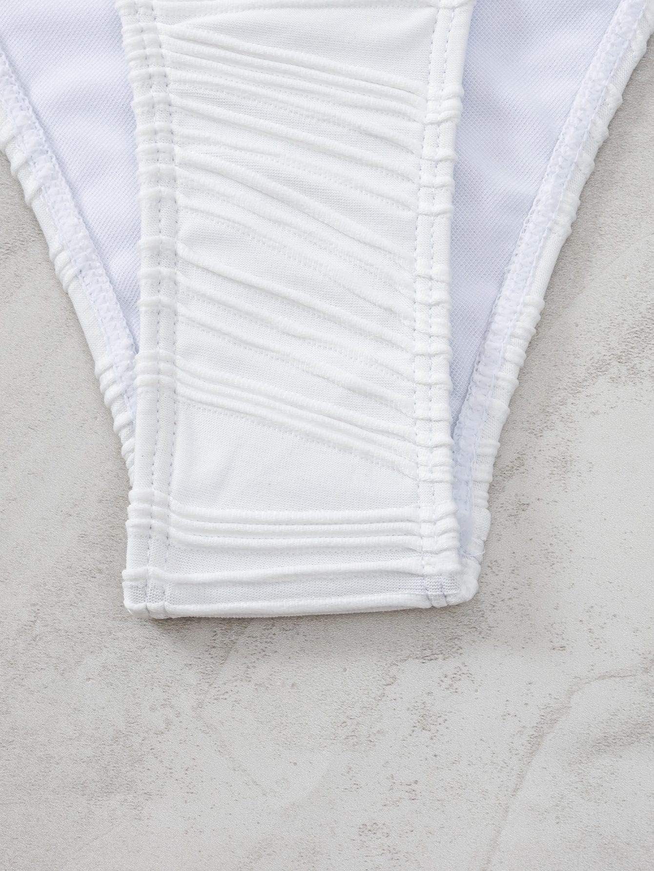 Glowwom White textured deep V one-piece swimsuit