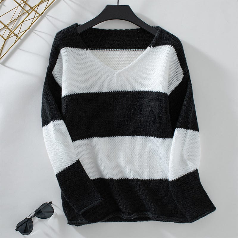 V neck striped sweater with black sunglasses on white background